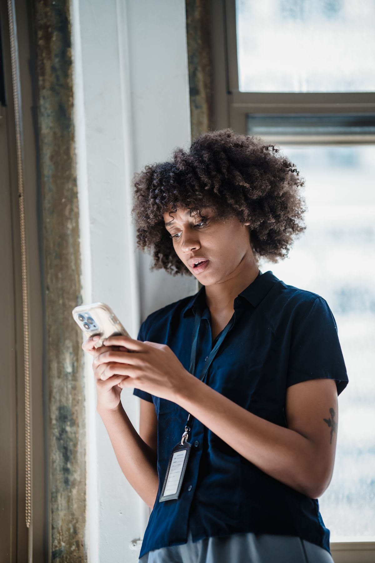 Office professional using a smartphone