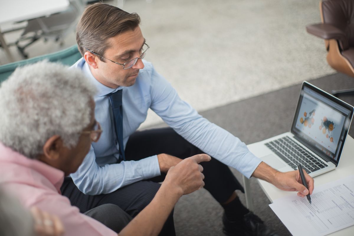 Colleagues reviewing business documents